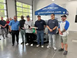 group standing together at vehicle donation 
