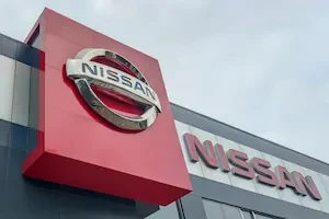 exterior of a Nissan building with logo