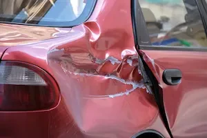 damaged red vehicle