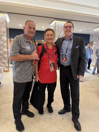 Pictured, left to right, are Carl Vincenti from Oka’s Auto Body, Scot Takemoto from Island Concepts,