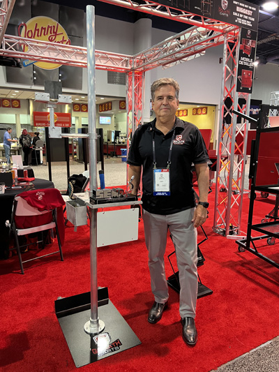 Dito Diez, owner and lead engineer at Goliath Carts, with his design, the destructive test weld stan