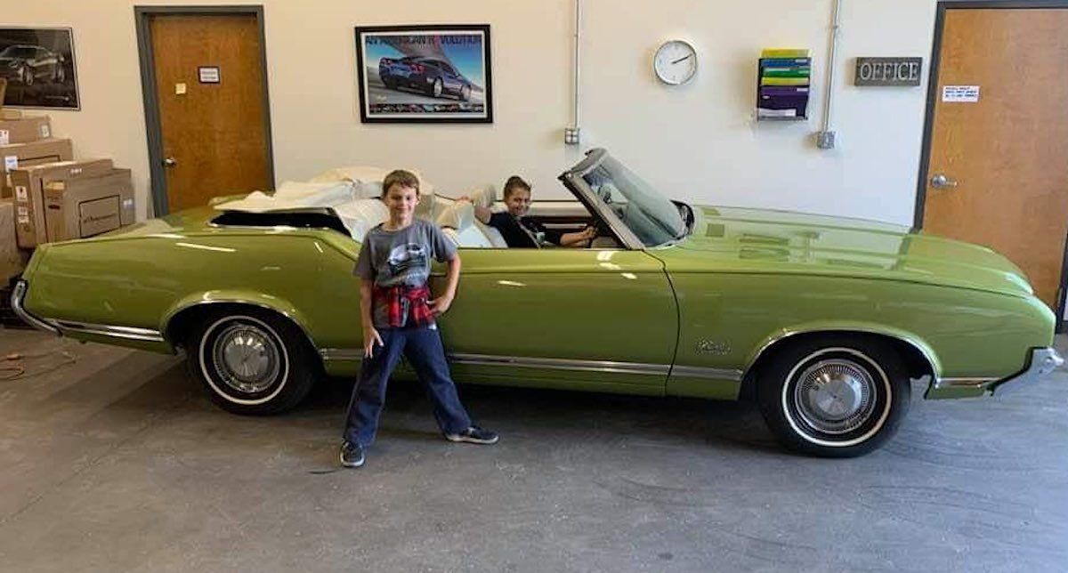 71 vintage green Oldsmobile cutlass supreme convertible with kids submitted by Shannon Berry full
