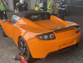 On The Lighter Side: Abandoned Tesla Roadsters Removed From Crates And Headed To U.S.