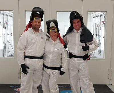 three-people-wearing-painters-suits