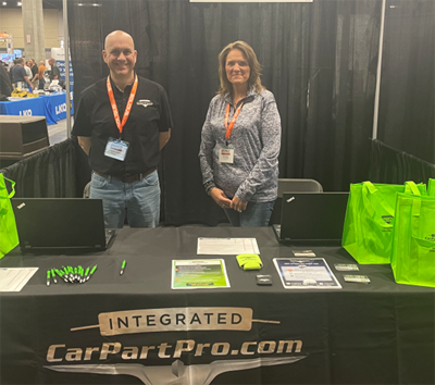 Jeremy Baines, left, and Lori Handke, right, at the Car-Part.com booth.