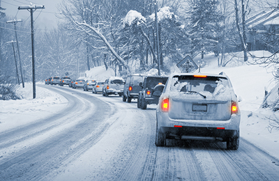 cars-driving-on-snowy-road-Pacific-Northwest