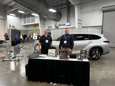Joe Maitland, left, and John Benskin, right, at the CAS of New England booth.