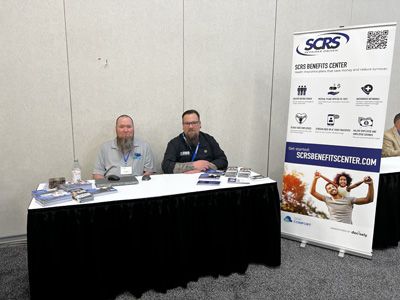 Scott Ayers, left, and Danny Gredinburg, right, at the SCRS booth.