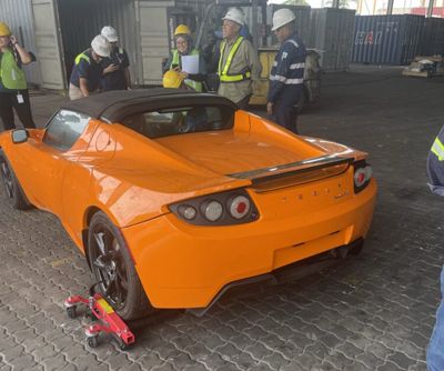 tesla-roadster-crate-abandoned-china_web_copy_1