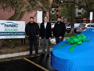 Phoenix Woman Presented with NABC Recycled Ride at I-CAR Western Regional Meeting