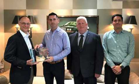 DC Autocraft, winner of the 2018 Bentley Bodyshop of the Year award for the Americas. From left to right: Jeff Wildman, Miro Bilaver, Austin Fife and Sebastian Grajales