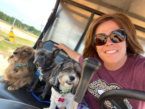 Laura Gay owns the Consolidation Coach, a consulting company that helps independent shops when they sell to MSOs. Here she is with her three dogs, from left, Mopsie, Stagger and Oscar.
