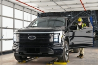 One year after Ford confirmed construction of the Rouge Electric Vehicle Center in Dearborn, MI, the first Ford F-150 Lightning pre-production units began leaving the factory. Pre-production model shown. F-150 Lightning available starting spring 2022.