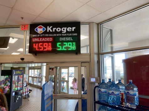 A digital sign inside a Kroger in Jackson, MI, displays the price of a gallon of gasoline and diesel fuel.