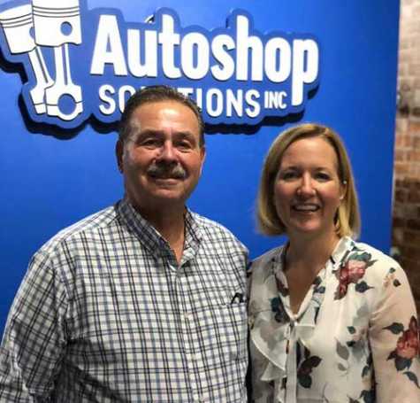 IGONC Executive Director Bob Pulverenti poses with Margaret Edmunds Palango, chief business development officer at Autoshop Solutions.