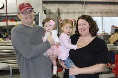 Matt Wellman is the new owner of Marquis Body Shop in David City, NE. Pictured here are his two daughters, Abigail and JoiseMae, and his wife, Sarah. 