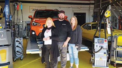 Pictured, left to right, are Marina, Matt and Nicole Radman at Coach Works Auto Body in Mesa, AZ.