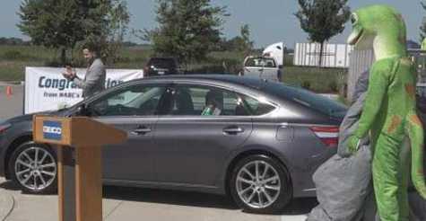 The Domestic Violence Intervention Program received a donated car from GEICO, Toyota of Iowa City, and ABRA Auto Repair and Glass at the GEICO offices in North Liberty, Iowa, on Thursday, Aug. 22, 2019.