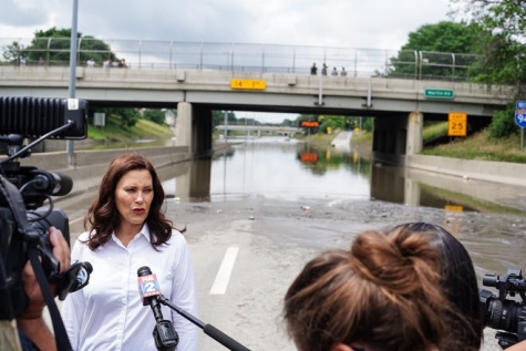 Michigan Gov. Gretchen Whitmer holds a press conference June 28 on I-94 near the Livernois Avenue exit after taking a tour of areas damaged by the flood in Detroit.