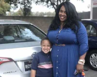 Army Veteran Eboni Strader, with her son Isaiah, received a 2014 Toyota Corolla from Caliber Collision in conjunction with Allstate Insurance as part of NABC&#039;s Recycled Rides program last year. 