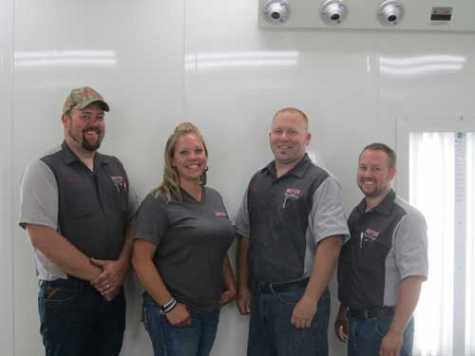  Meyer Body and Paint owners Eric and Andrea Meyer with technicians Clifford Judkins and Brian Bries. 