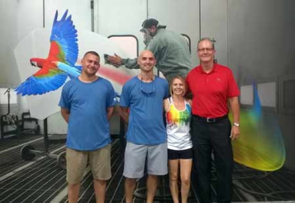 (Left to right) Auto &amp; Marine Finishes co-owners Chris McDevitt and Jonathan Niehaus, Financial Manager Sara Niehaus and BASF Network Development Manager Gerry Malloy at their new BASF ColorSource location in Sarasota, Florida.