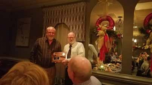 IGONC Triangle Chapter President Steve Poole (right) presented plaque to past president Stan Creech.