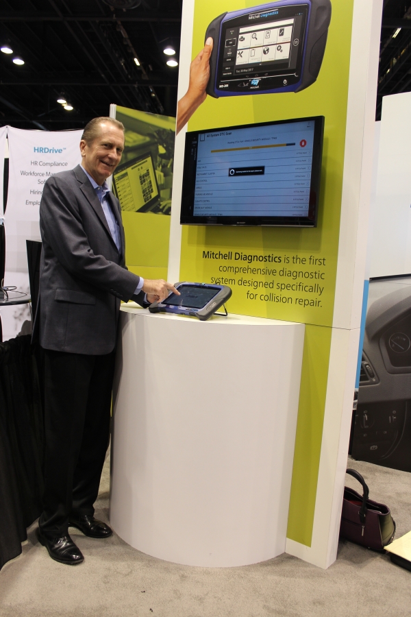 Jack Rozint, vice president of sales and service at Mitchell International, demonstrates the Mitchell Diagnostics system during NACE Automechanika 2017 in Chicago, IL. 